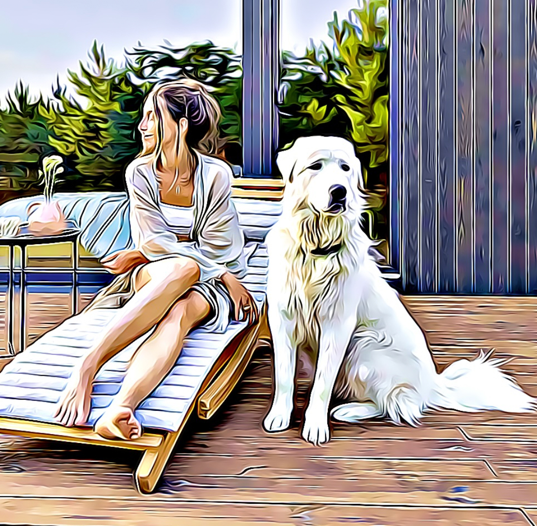 Dog-sitting-next-to-woman